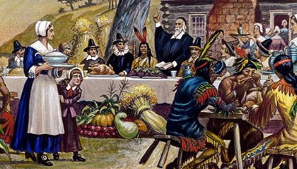 picture of the pilgrims eating thanksgiving dinner