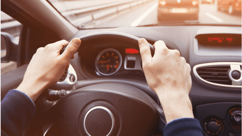 Person driving safely during their morning commute.